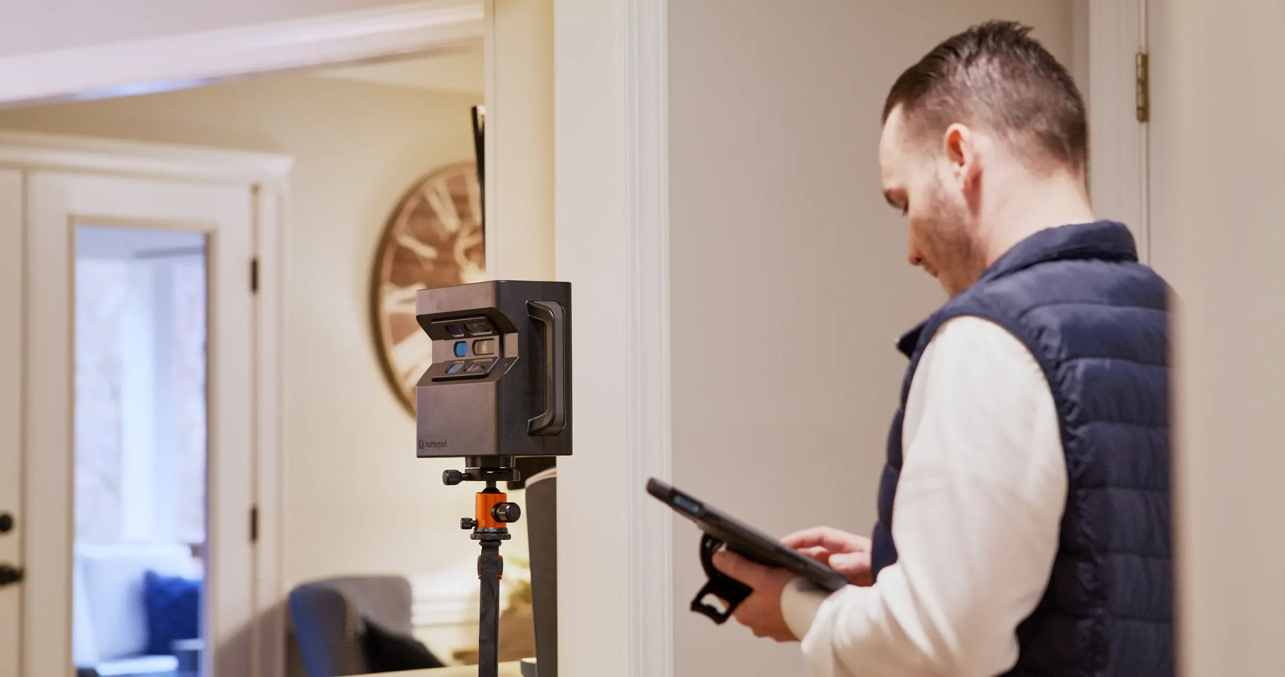A man operating a 3D interior design simulator