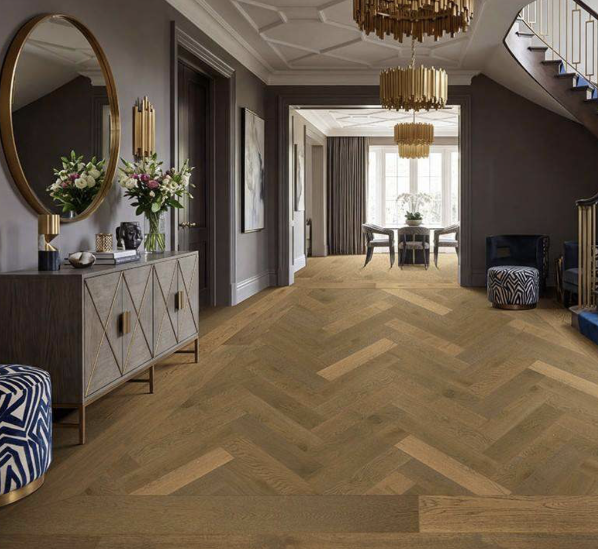 Herringbone pattern wood flooring in home entryway