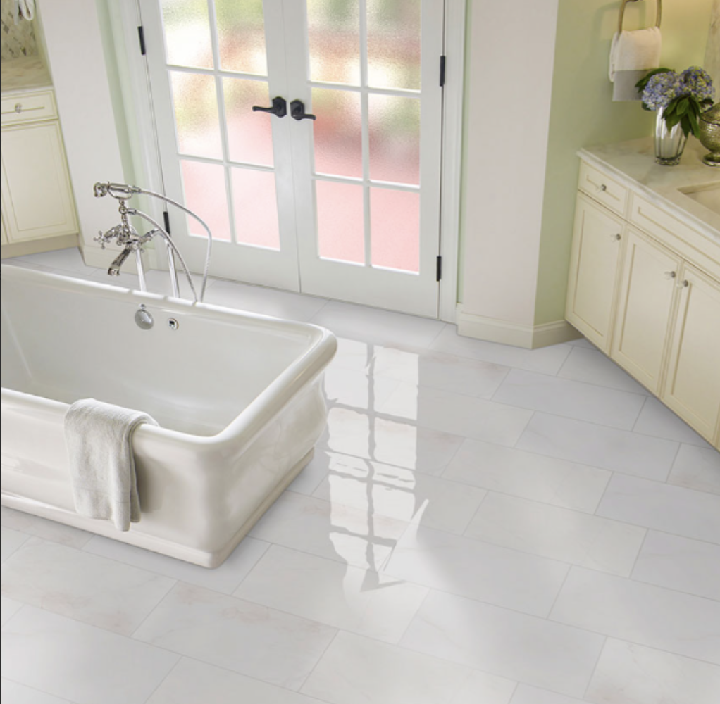 Frosty white tile floor with white bathtub