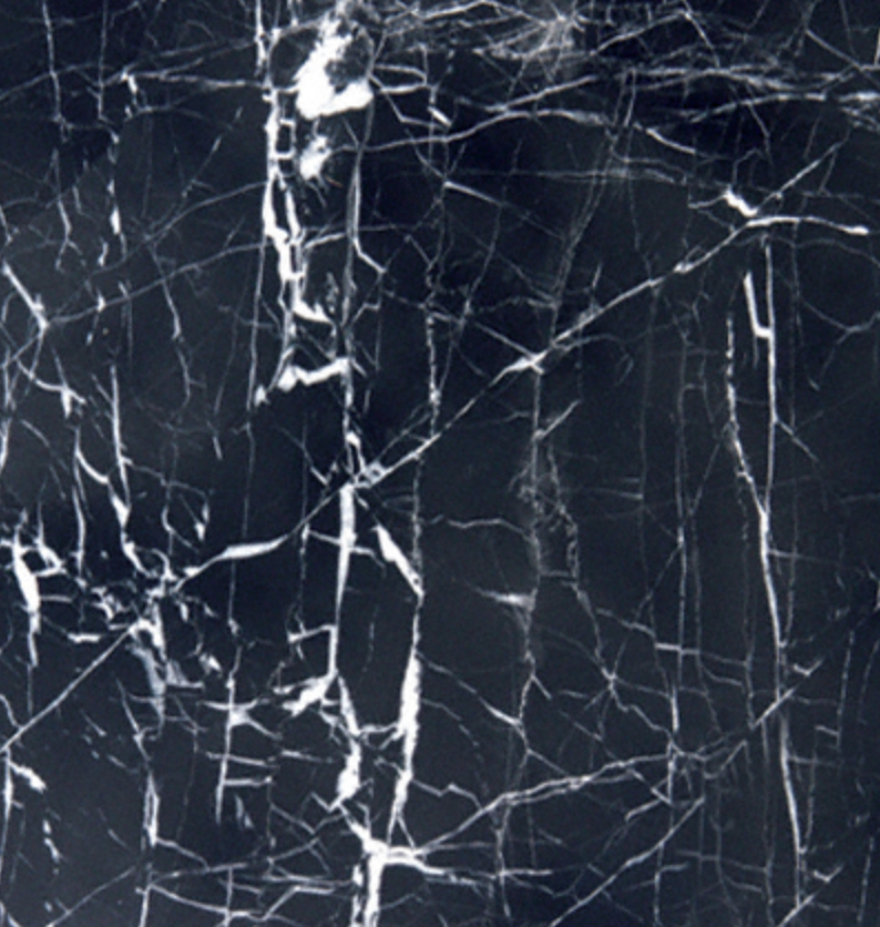 Close up of tile with small white marbling