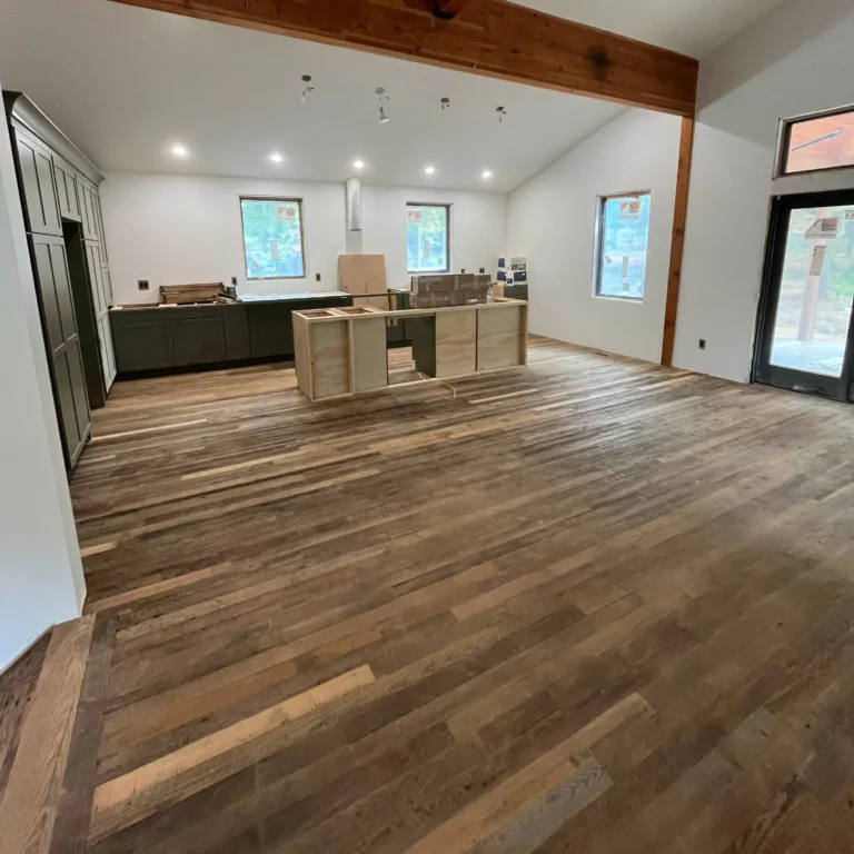 Newly installed wooden flooring in a modern farmhouse style room