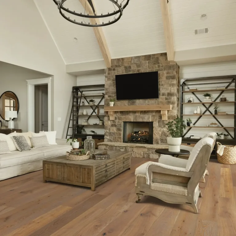 Modern farmhouse style living room home Neo Concept renovation with high ceiling, wooden beams, and a stone fireplace with a tv mounted on top.